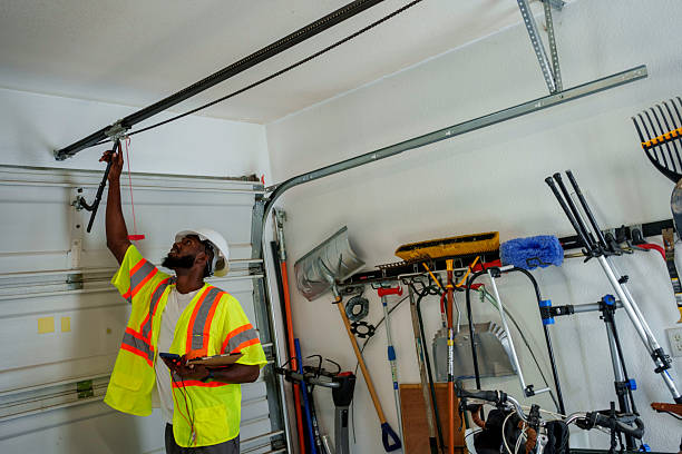 Professional Garage Door Roller Replacement technician working in Delevan, NY
